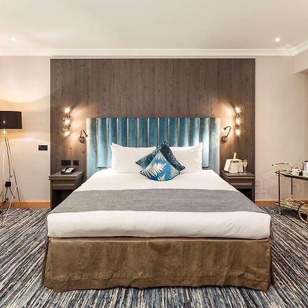 Courthouse Hotel Londra Exterior foto A bedroom at the hotel